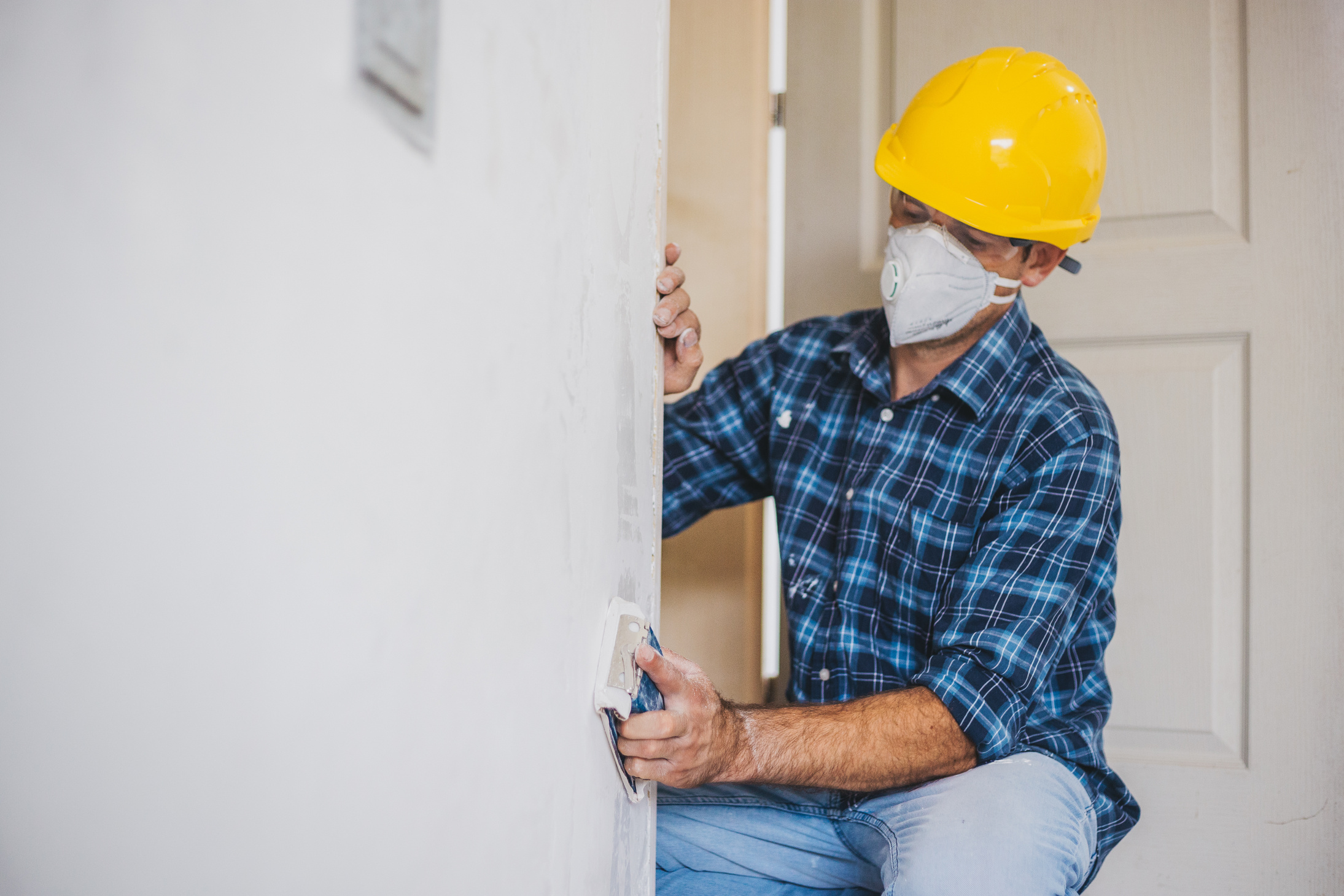 Sanding a drywall